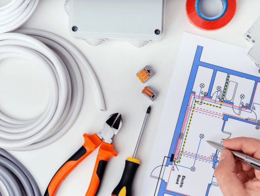 electrician-checking-electrical-plans-concept-repair-electrical-equipment 1-min